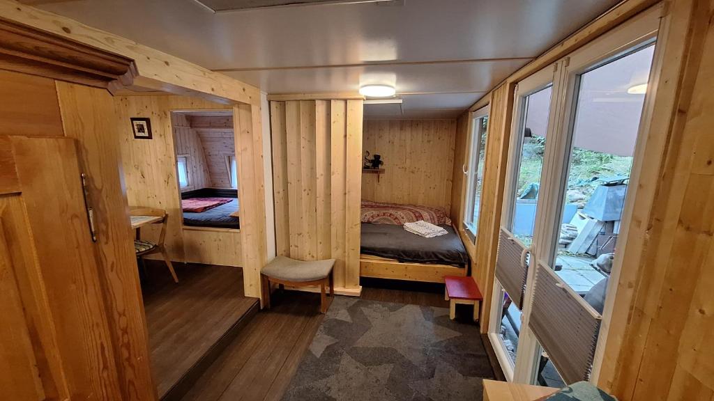 En eller flere senge i et værelse på Hütte 28