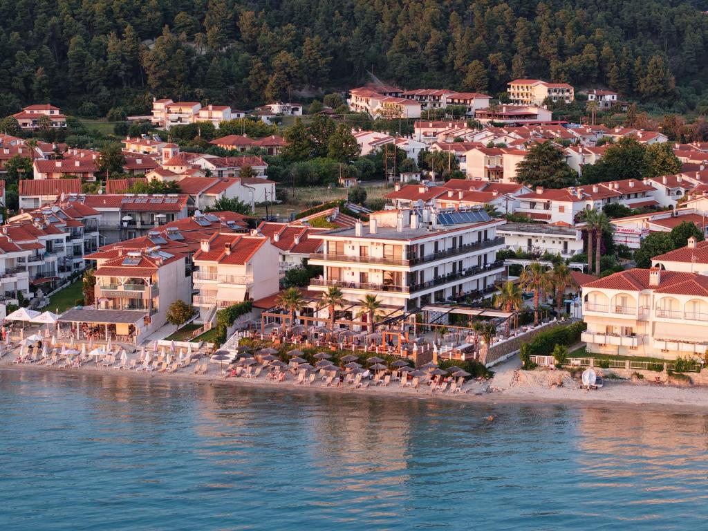 an aerial view of a resort on the beach at EVLOGIA HOTEL SEAFRONT and ANEX by Greek Pride in Fourka