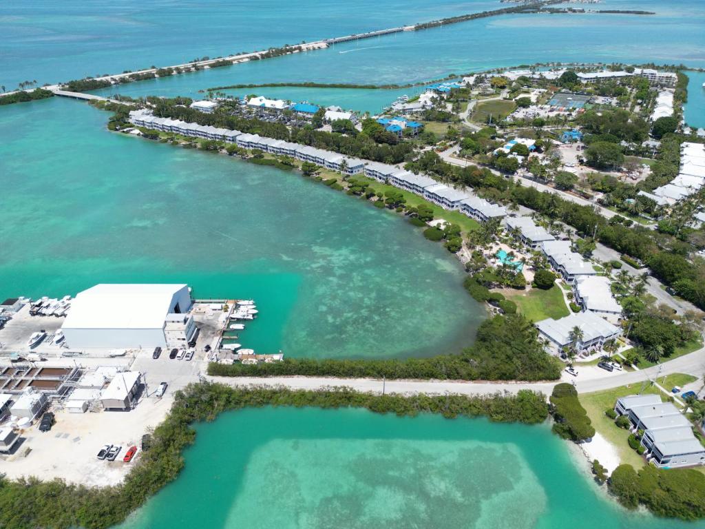 an aerial view of the resort and the water at Blue House Getaway - 2BR 3BA Coastal Villa in Duck Key