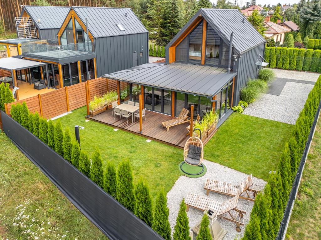 an overhead view of a house with a backyard at LoveLake dom z jacuzzi in Sława