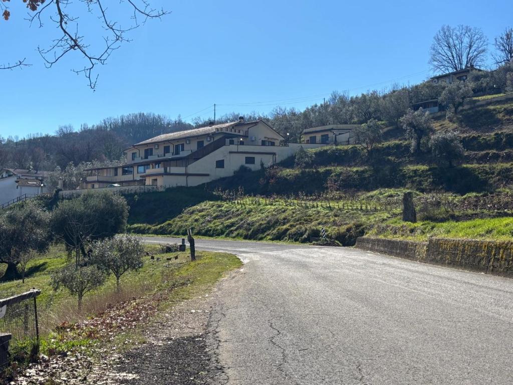 an empty road with houses on the side of a hill at Appartamento senza cucina - Casale Michel in Arpino