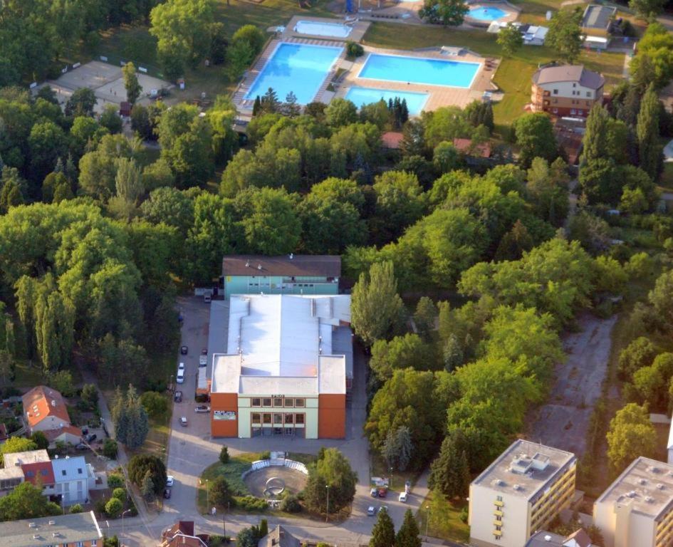 an aerial view of a building and a pool at Penzion PKO Nitra in Nitra