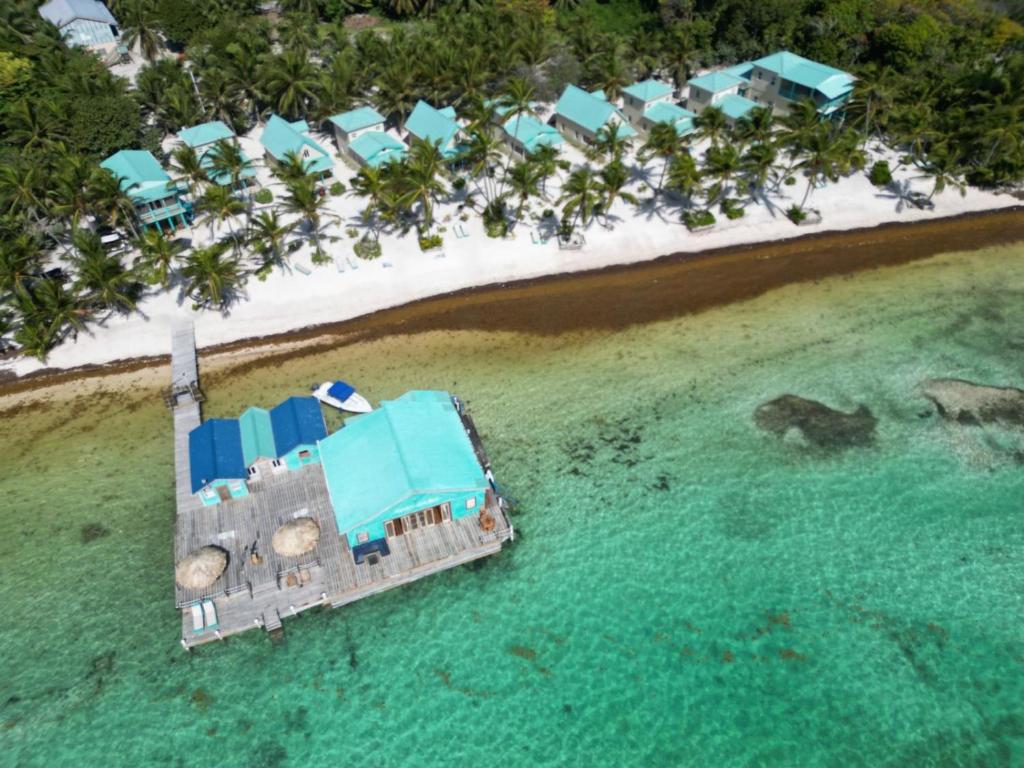 an aerial view of a resort on a beach at Tranquility Bay Resort in San Pedro