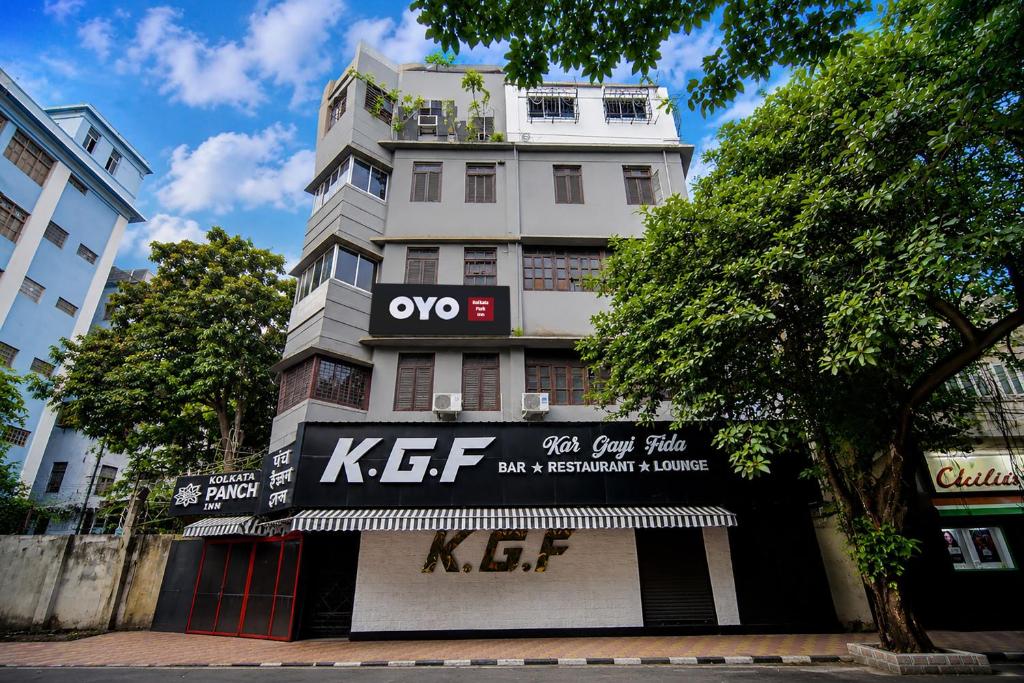 a building with a sign on the front of it at Hotel O Kolkata Park Inn in Kolkata
