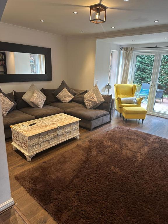a living room with a couch and a coffee table at Location, location in Gateshead