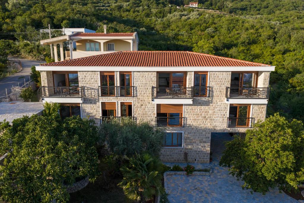 an aerial view of a house with a roof at Amd Ville Apartments in Dobra Voda
