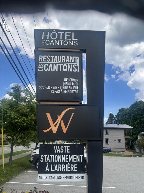 a sign for a hotel and restaurant conventions at hote lw des cantons in Weedon-Centre