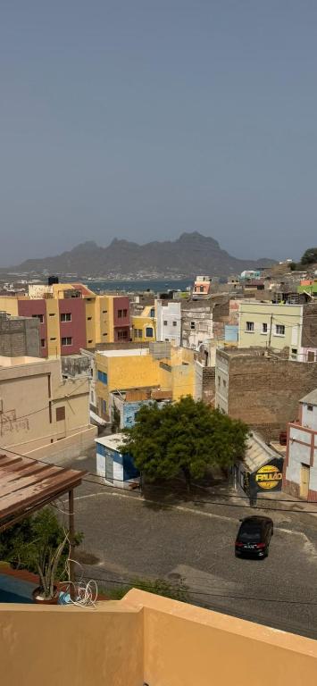 a view of a city with a car on a street at S Vicente Live in Mindelo