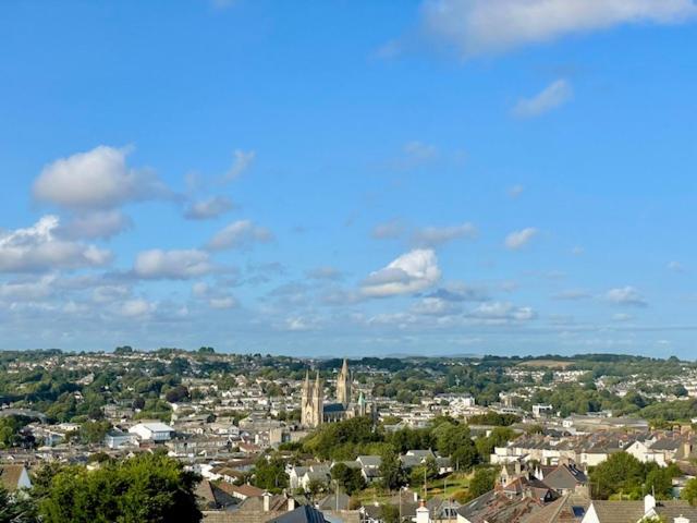 a view of a city under a cloudy sky at Belle-Vue in Truro