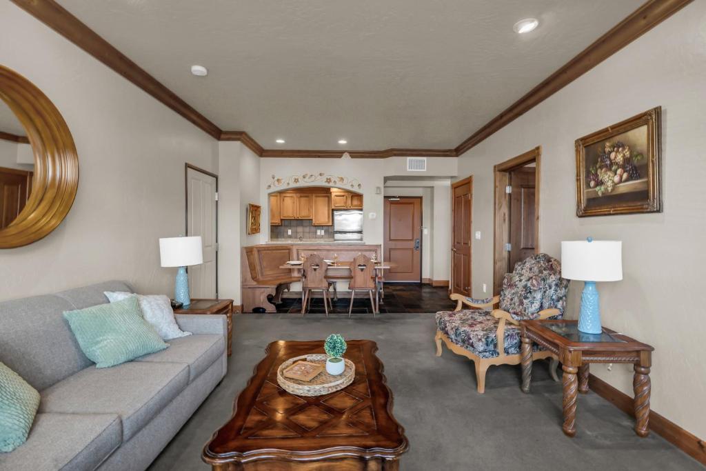 a living room with a couch and a table at Zermatt Mountain Suite and 1BDR in Midway