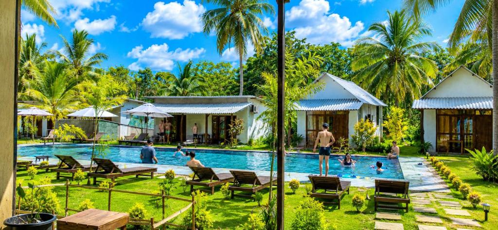 a view of the pool at the resort at Traveller's Home Safari Resort in Udawalawe