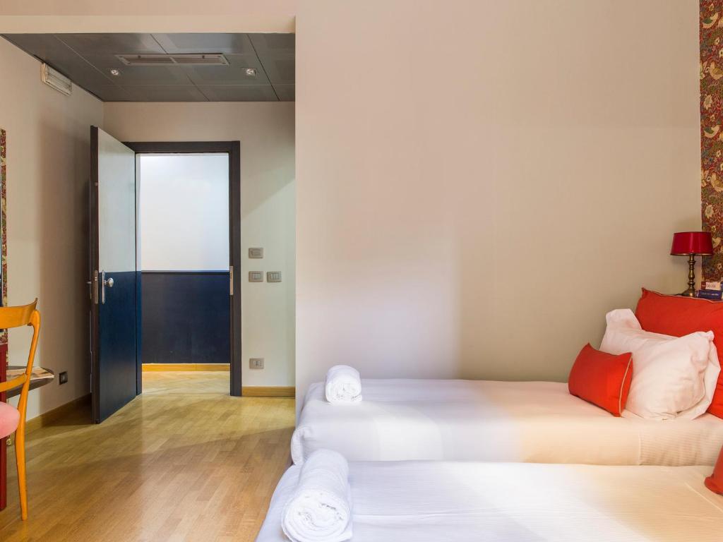 Cama o camas de una habitación en Monti First