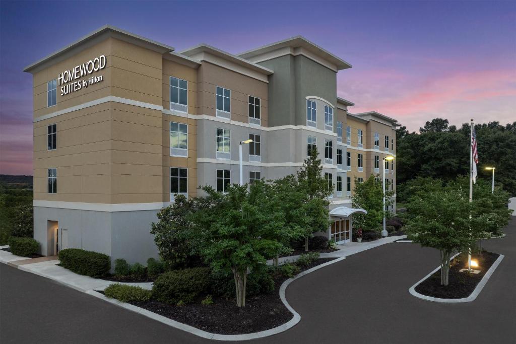 a rendering of the exterior of a hotel at Homewood Suites Mobile in Mobile
