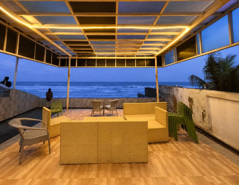 a room with a view of the ocean at Hotel Dreamland Mandarmani in Mandarmoni