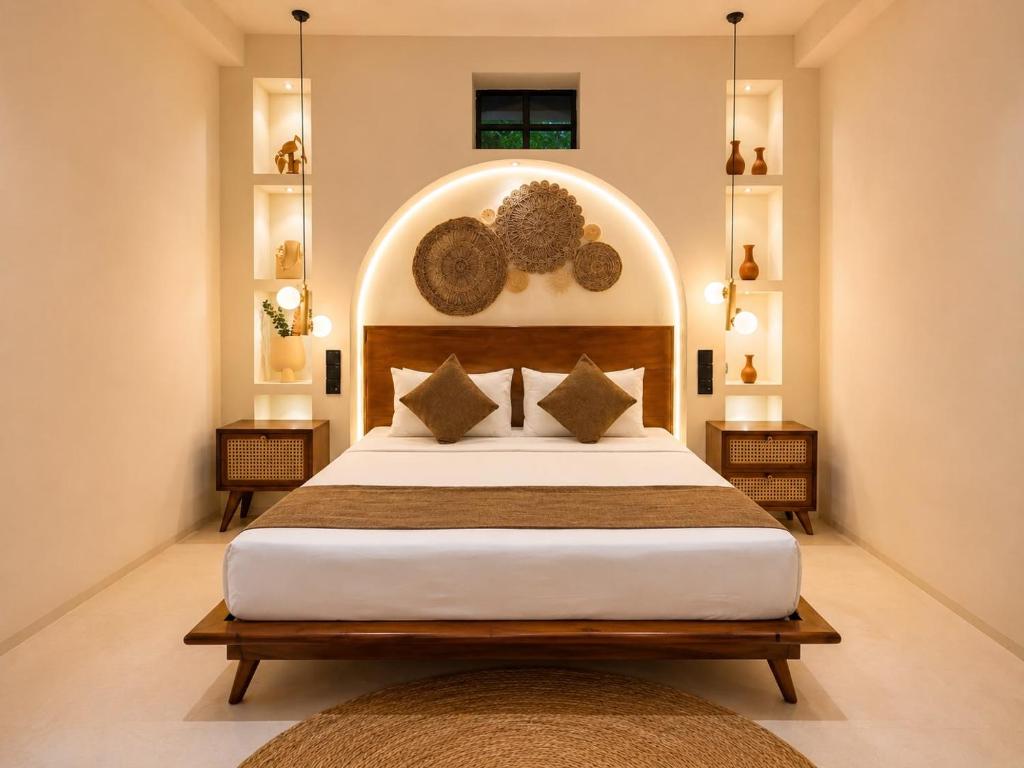 a bedroom with a large bed in a room at The Neylipz - Fully Air Conditioned 3 bedroom Apartment in Weligama