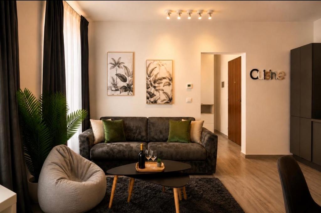 a living room with a couch and a table at Apartment Vitale in Bologna