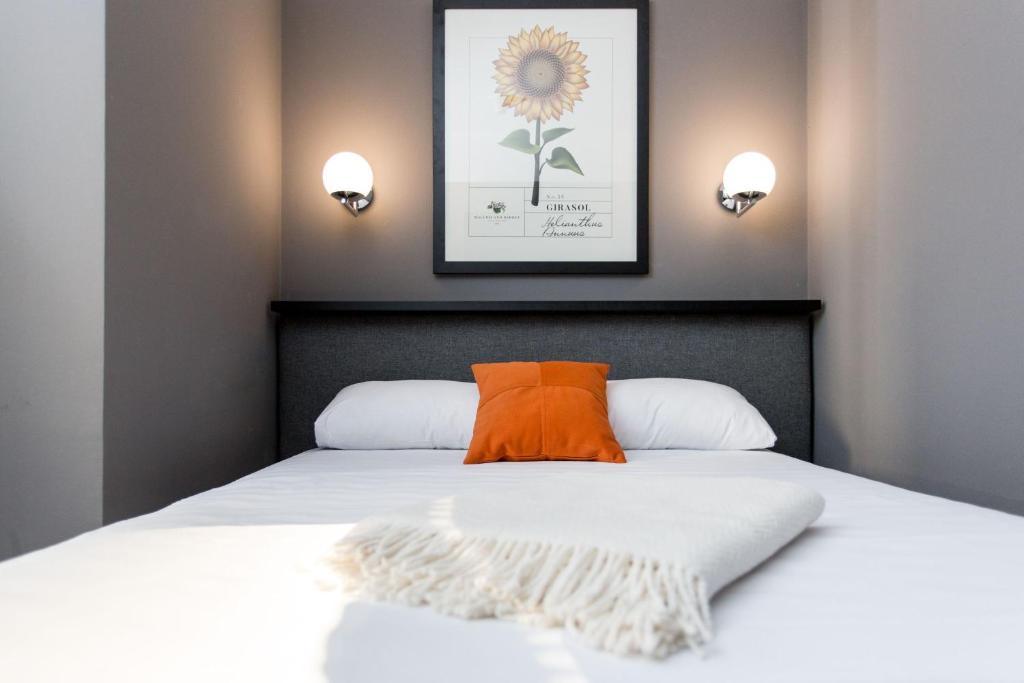 Cama o camas de una habitación en Hotel Malcom and Barret