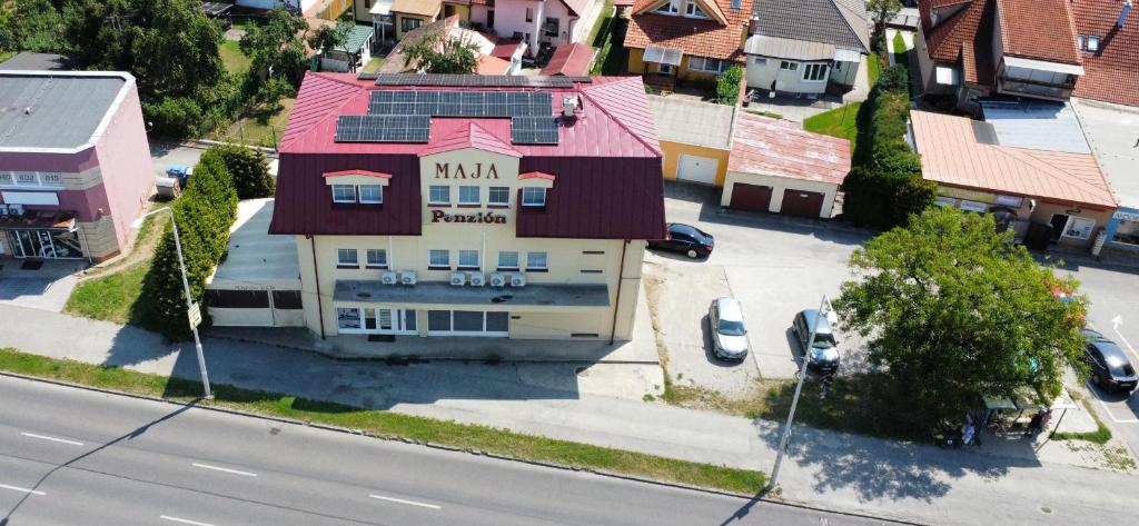 an overhead view of a building on a city street at Penzion Maja in Martin