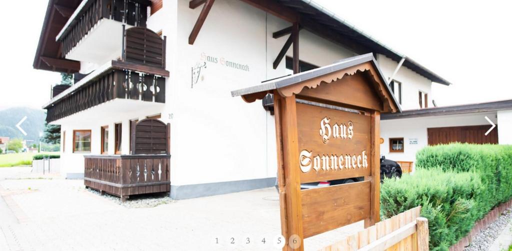 a sign on the side of a building at Haus Sonneneck in Schwangau
