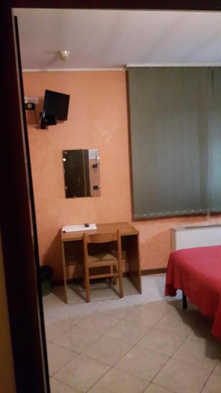 TV a/nebo společenská místnost v ubytování Hotel Armida