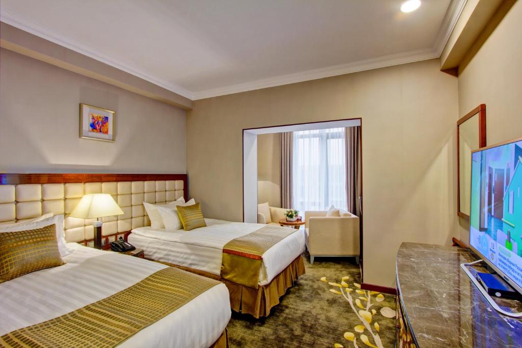 TV a/nebo společenská místnost v ubytování Hotel Lulu