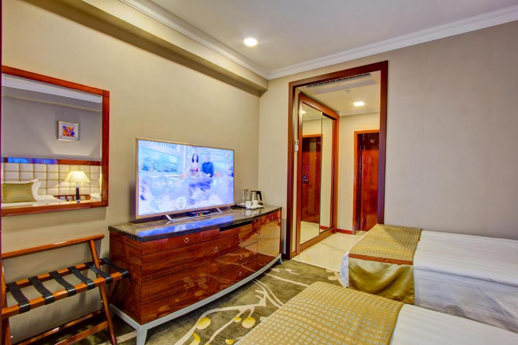 TV a/nebo společenská místnost v ubytování Hotel Lulu