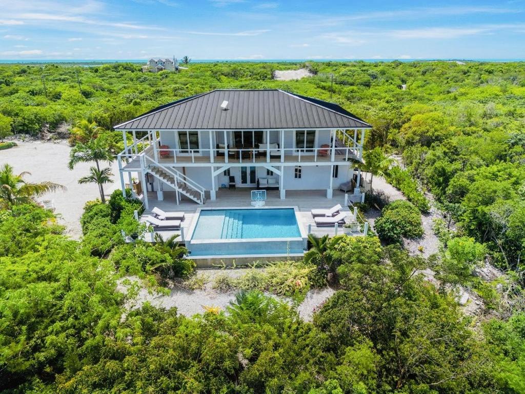 an aerial view of a house with a swimming pool at The View Villa in Hartswell