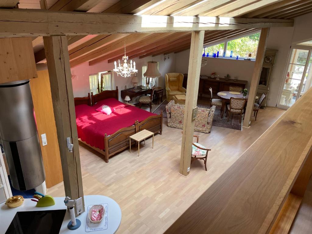 an overhead view of a bedroom and a living room at Landidyll Engelhofen in Obersontheim