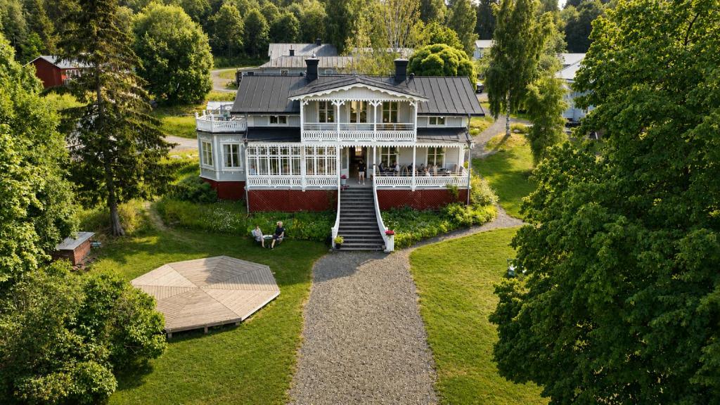 an aerial view of a large white house at Villa Fridhem, Härnösand in Härnösand