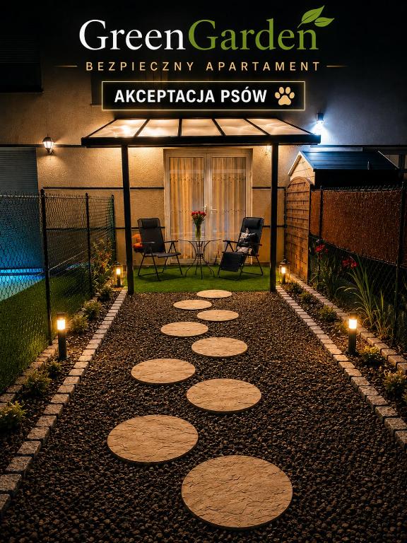 a patio with lights and a sign that reads green garden brewery apartment at Apartamenty Green Garden z ogrodem i przyjazne dla zwierząt, Racibórz in Racibórz
