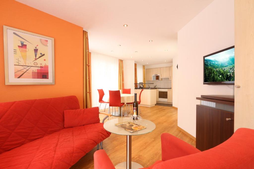 TV a/nebo společenská místnost v ubytování Appartements Feehof