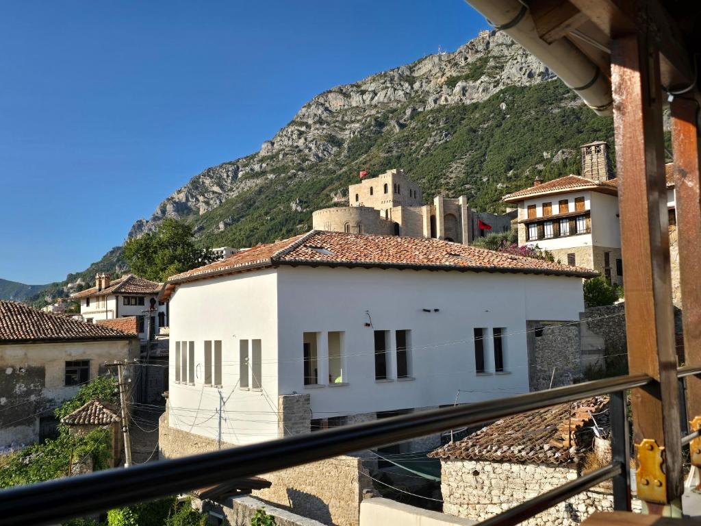 a view of a town with a mountain in the background at Castle - inside,Voga Guesthause in Krujë