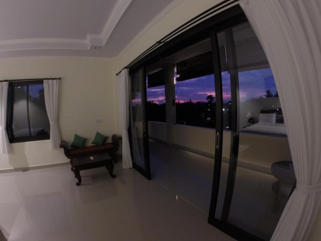 Balkón nebo terasa v ubytování Ubud Wins Bungalow