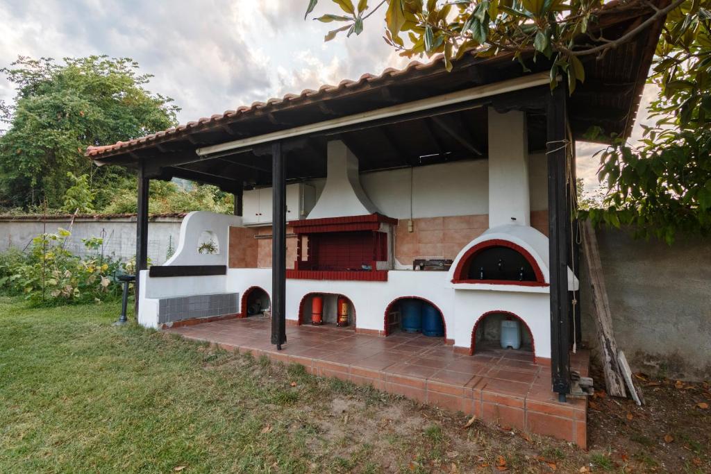 a model of a house with an outdoor oven at Villa Lito in Litochoro