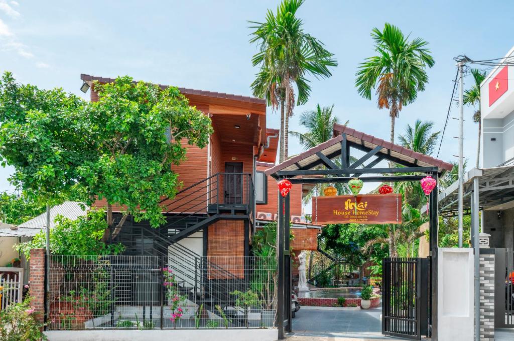 a house with a sign in front of it at Mai House Homestay - Long-term rental in Hoi An, Da Nang in Thanh Ðông (1)
