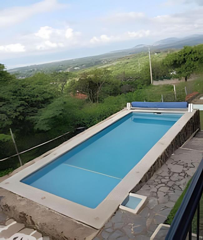 a swimming pool with a view from a house at 6-Private Pool and View of Lake Chapala in Chapala