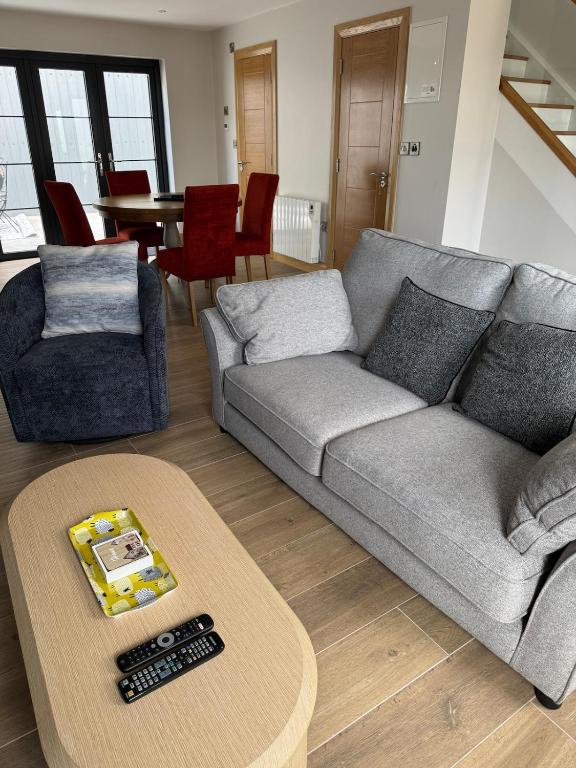 a living room with a couch and a coffee table at The Terrace Collection Number 2 in Tramore