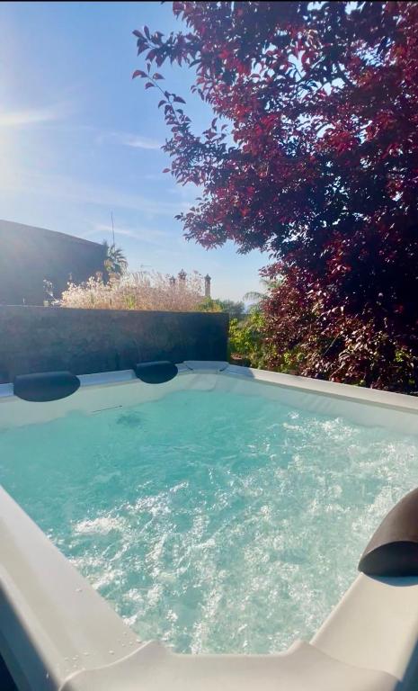 a swimming pool with a view of the water at Casa Tua - Countryhouse- in Sorrento