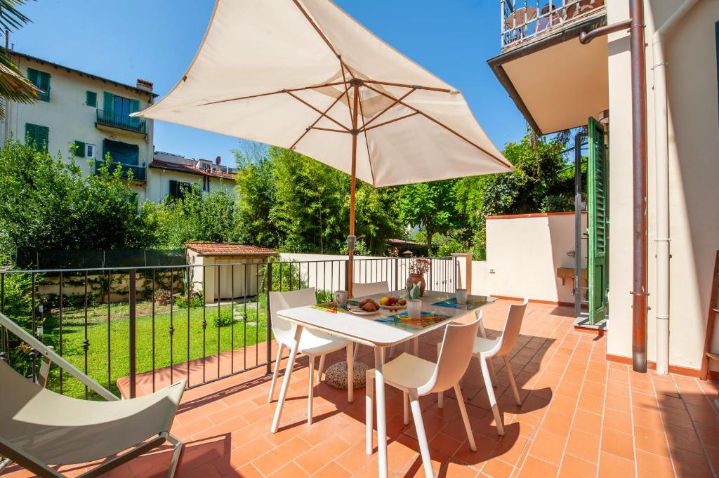 Luminoso Appartamento con Giardino e Terrazza Privati - 2 Camere - Parcheggio Comodo