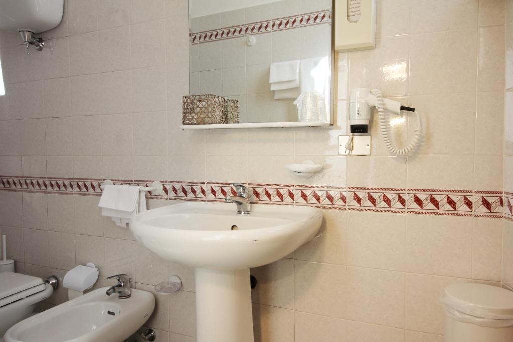 Koupelna v ubytování Hotel Pallotta
