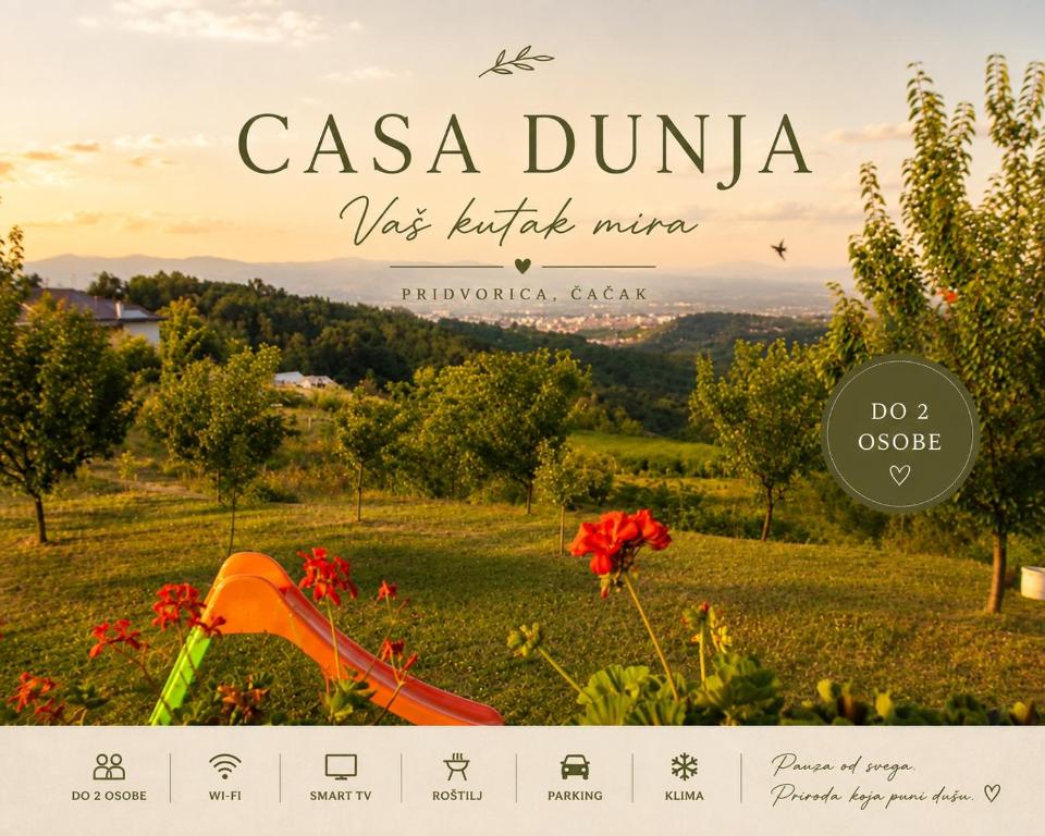 a calendar with a view of a field with flowers at Casa Dunja Čačak in Čačak