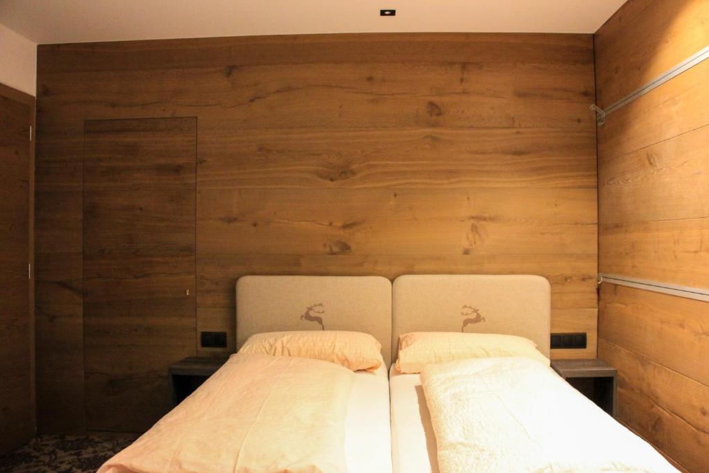 Postel nebo postele na pokoji v ubytování Landhaus Winkl