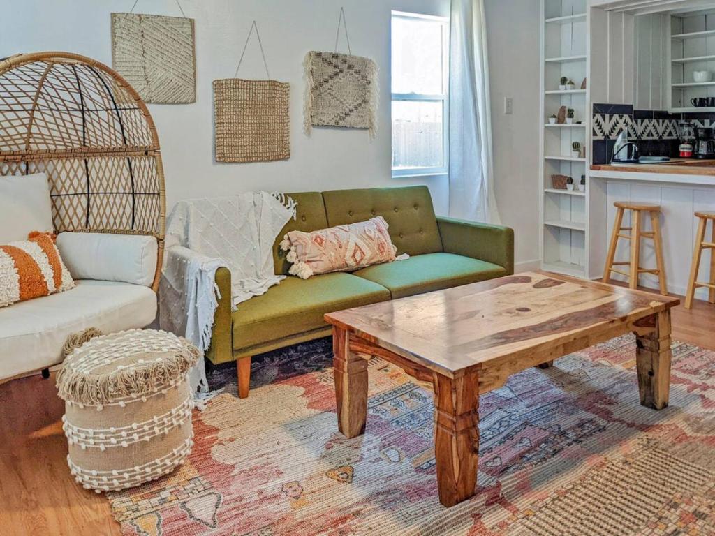 a living room with a couch and a coffee table at Pet-Friendly Near Zion & Hot Tub in Downtown Kanab in Kanab