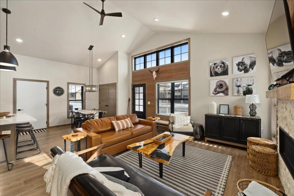 a living room with a couch and a table at Evergreen Retreat Red Lodge in Red Lodge