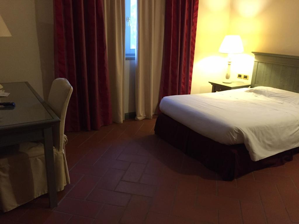 Uma cama ou camas num quarto em Bes Hotel Bergamo Cologno al Serio