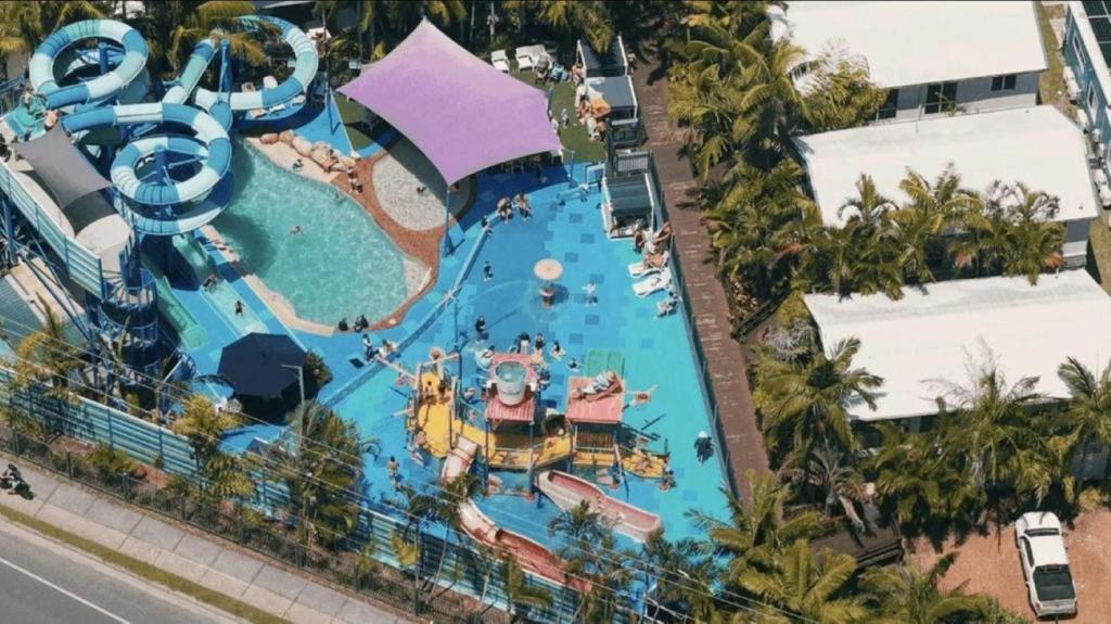 an overhead view of a large pool at a resort at Tasman Holiday Parks - North Star in Hastings Point