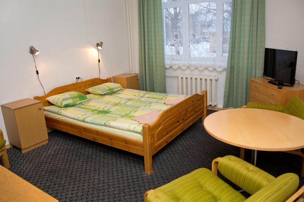 Voodi või voodid majutusasutuse Student Hostel toas