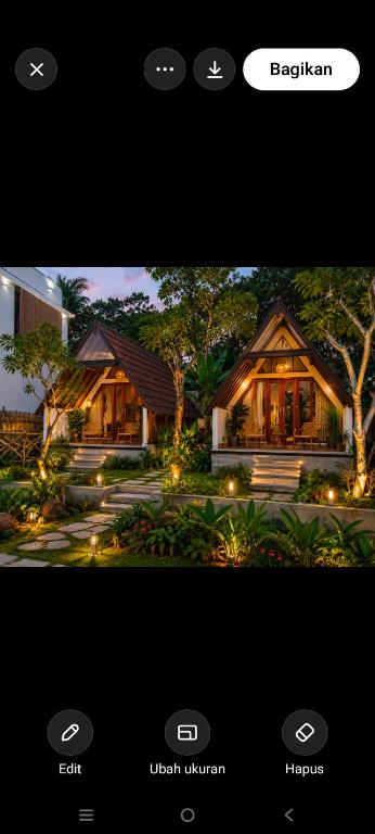 a screenshot of a house with lights on it at Prima Eco Cabin in Pabean Buleleng