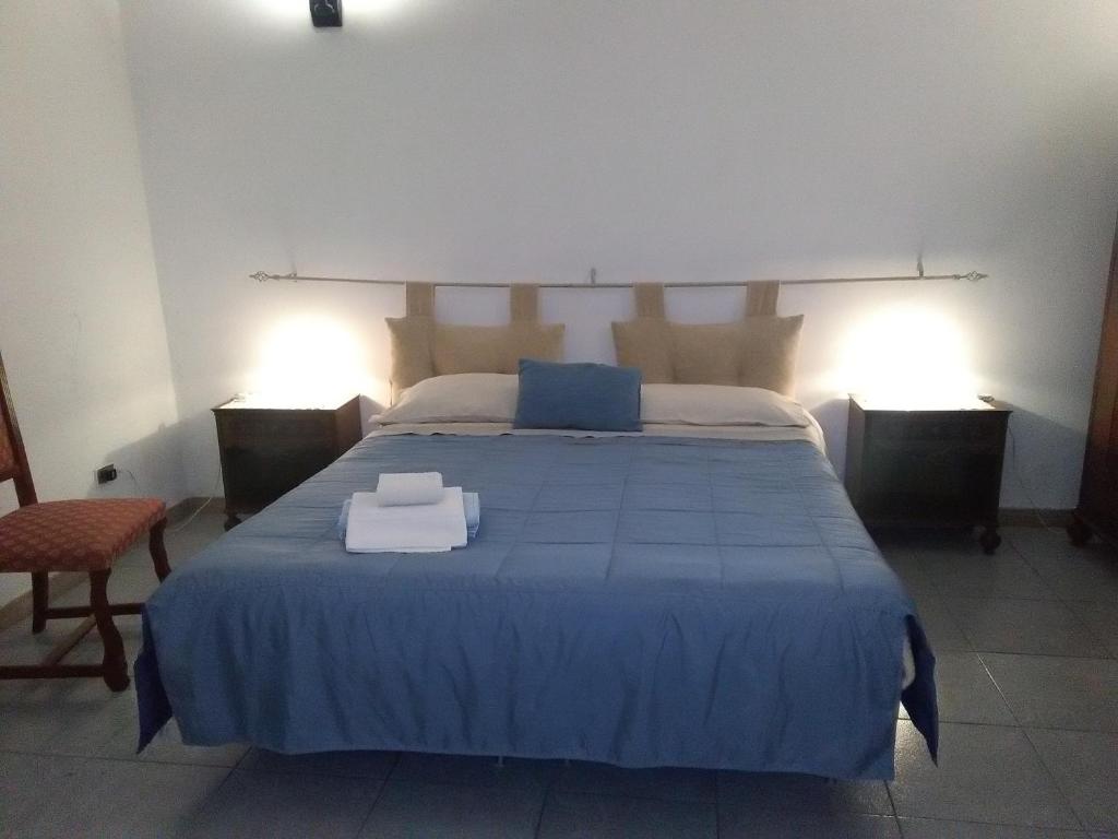 Postel nebo postele na pokoji v ubytování B&B Il Tulipano