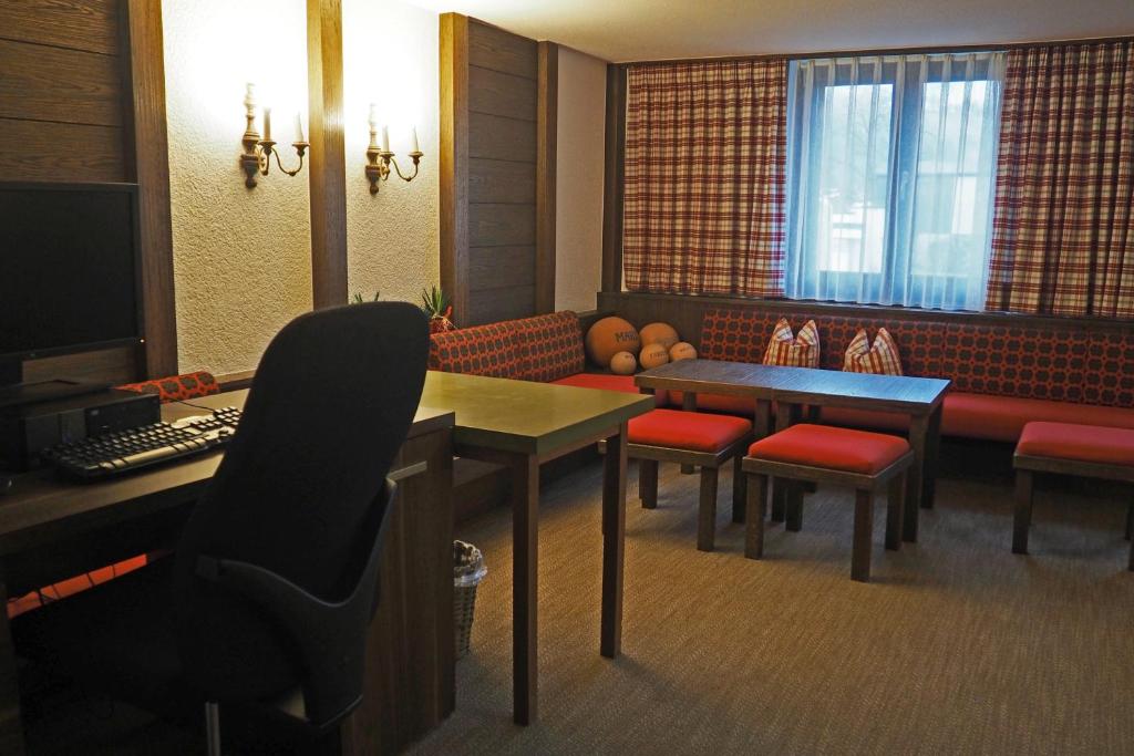 TV a/nebo společenská místnost v ubytování Hotel Restaurant Rössle